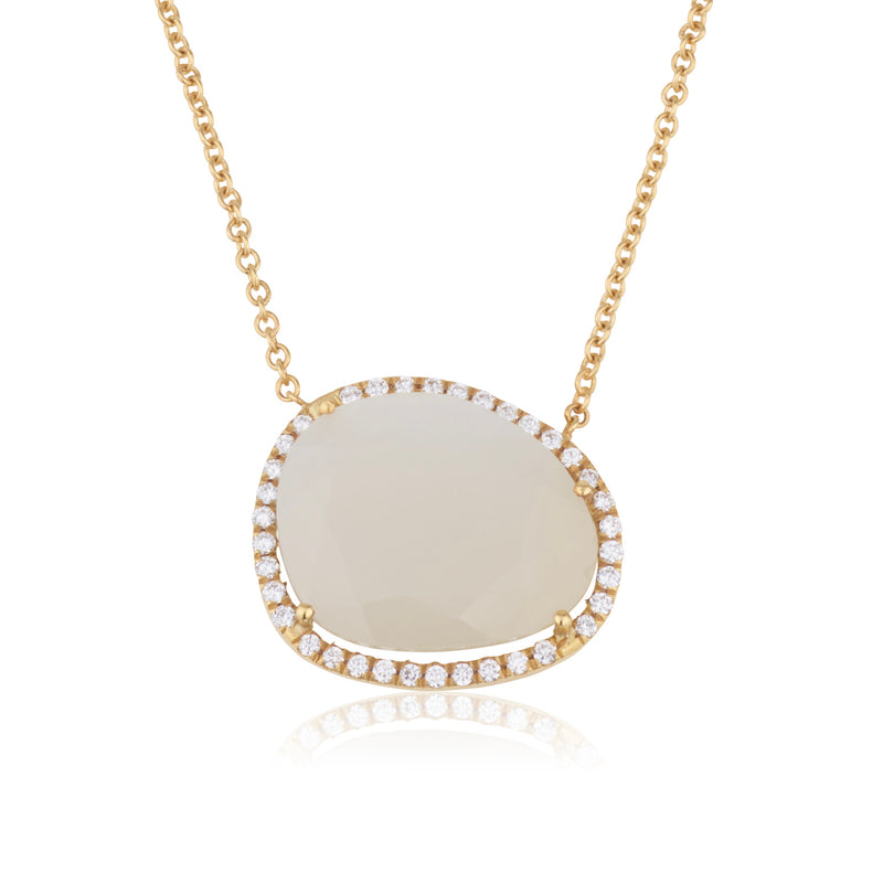 Amorphous moonstone pendant set with diamonds