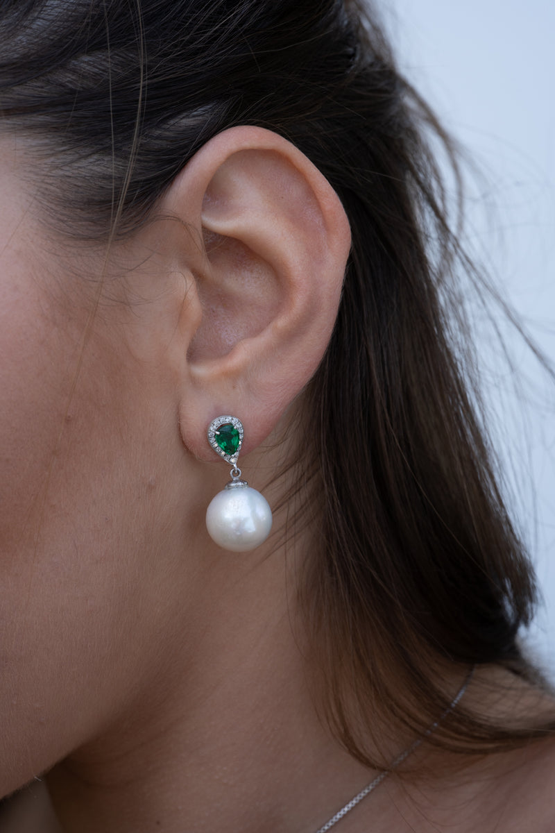 Dangling pearl earrings with green chatham