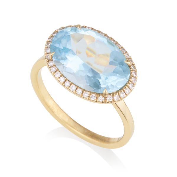 Spectrum | oval Blue Topaz yellow gold solitaire with diamonds