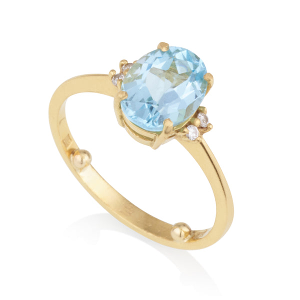 Spectrum | Dainty oval blue Topaz solitaire cocktail ring