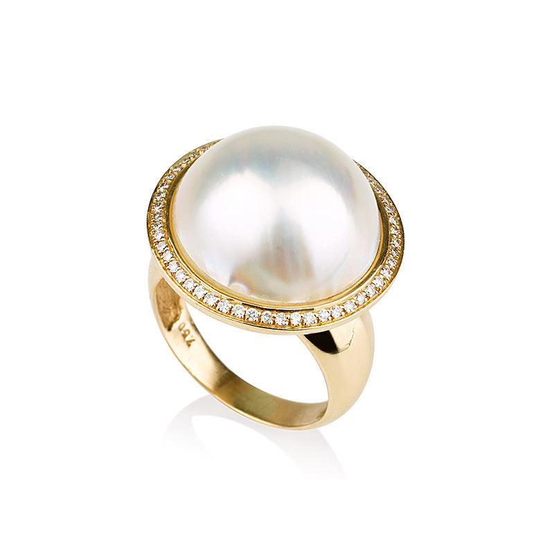 A Classic pearl ring with diamond halo