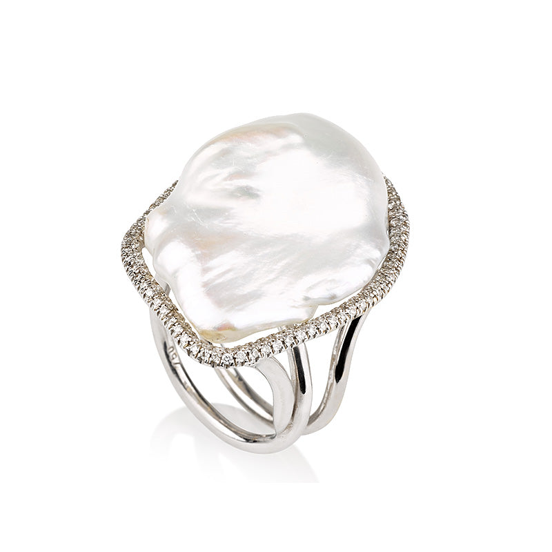 Pearls | An exquisite Baroque pearl ring with diamond halo.